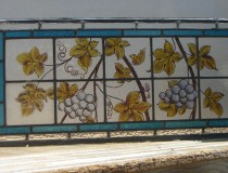 stained glass with painted grapes